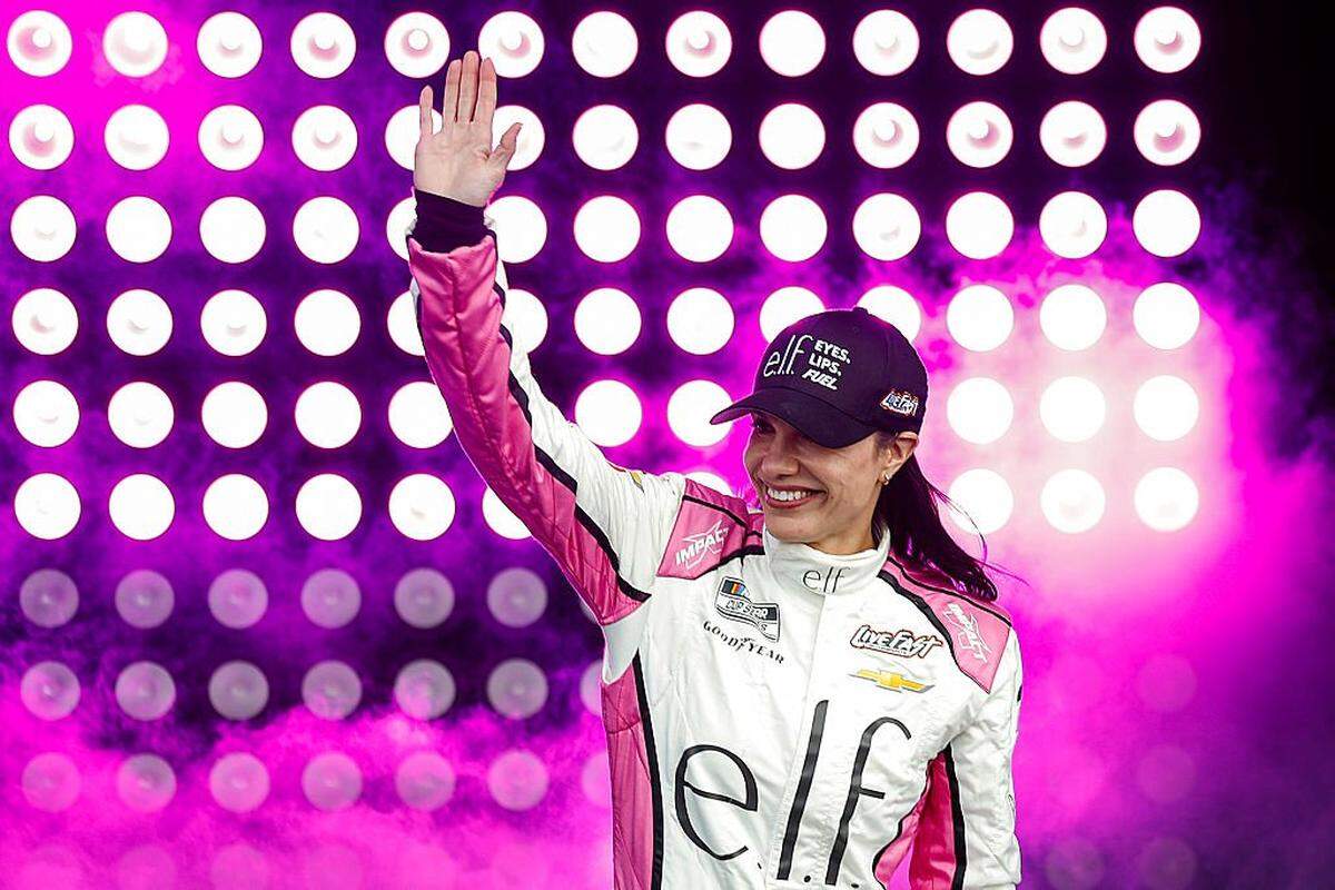 WATKINS GLEN, NEW YORK - MAY 10: Katherine Legge, driver of the #78 e.l.f. Chevrolet, waves to fans as he walks onstage during driver intros prior to the NASCAR Cup Series Go Bowling at The Glen at Watkins Glen International on May 10, 2026 in Watkins Glen, New York. (Photo by Sean Gardner/Getty Images)