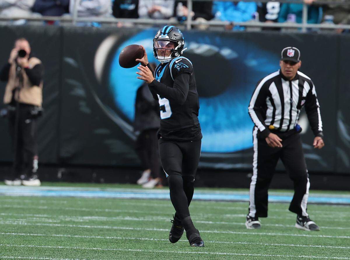 Carolina Panthers quarterback Bryce Young looks downfield during a 2025 game at Bank of America Stadium in Charlotte.