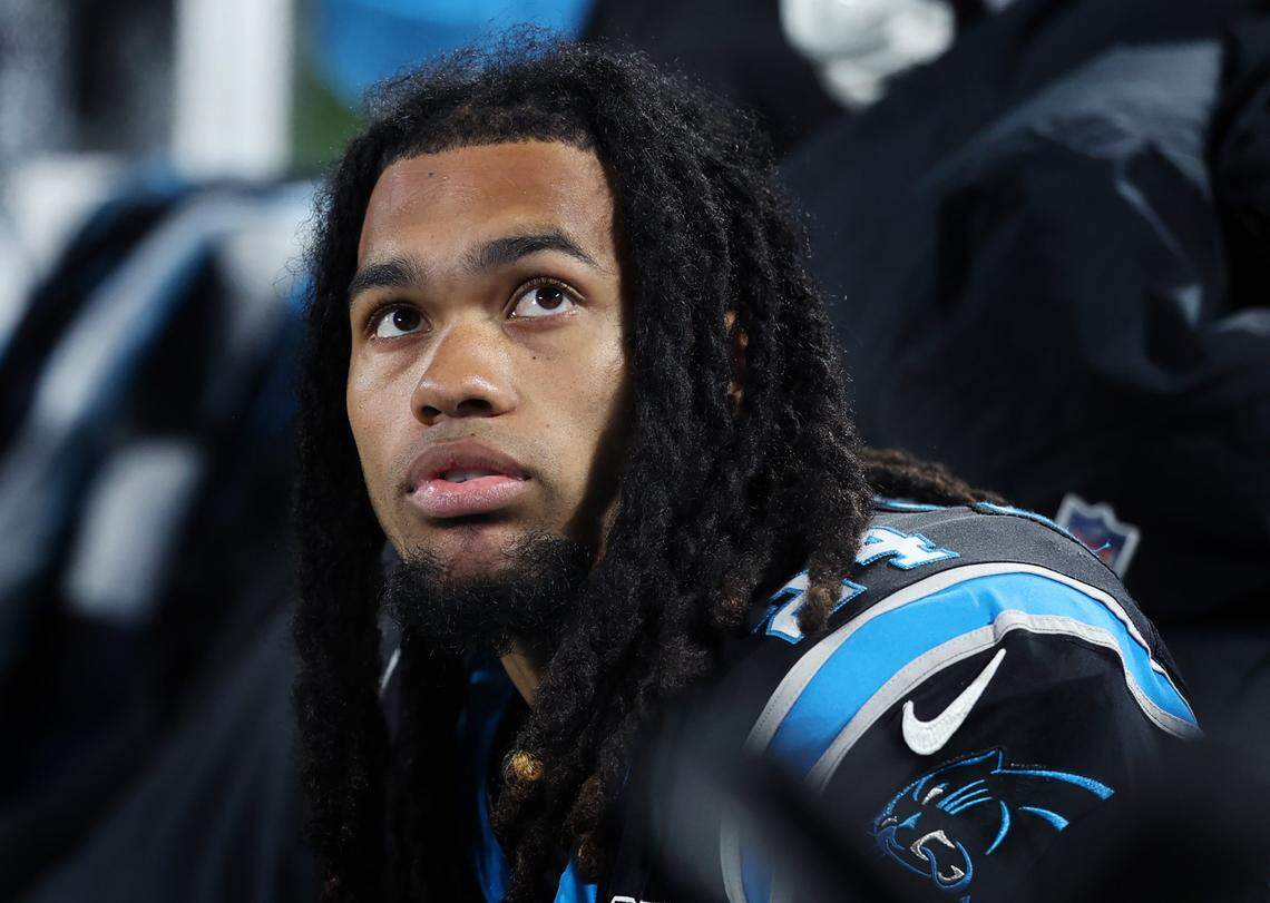Carolina Panthers running back Jonathon Brooks watches a replay from the team’s sideline during action against the Tampa Bay Buccaneers on Dec. 1, 2024, at Bank of America Stadium. The Buccaneers defeated the Panthers in overtime 26-23. 