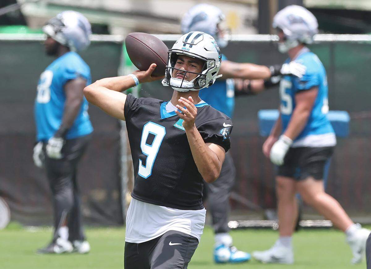Carolina Panthers quarterback Bryce Young passes to a receiver during the team's first open workout on Tuesday, May 26, 2026.