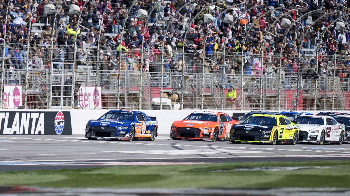 Mar 19, 2023; Hampton, Georgia, USA; NASCAR Cup Series driver Joey Logano (22) leads the field to green at Atlanta Motor Speedway. Mandatory Credit: David Yeazell-USA TODAY Sports