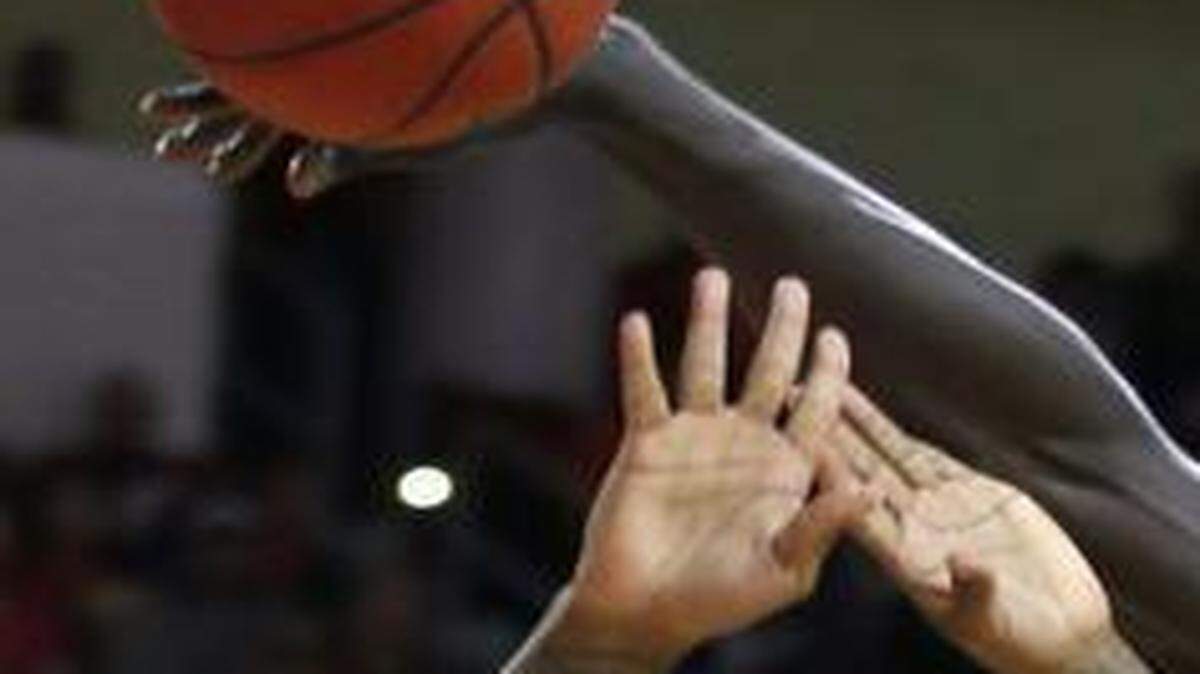 
Clemson's Sidy Djitte (50) blocks a shot by North Carolina State's Cat Barber (12) during the first half at PNC Arena in Raleigh, N.C., on Wednesday, Jan. 28, 2015. 
