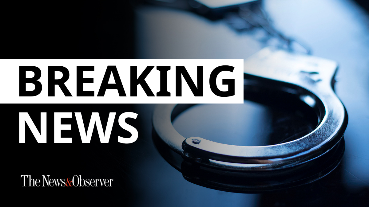 News & Observer breaking photo featuring handcuffs, used for arrests